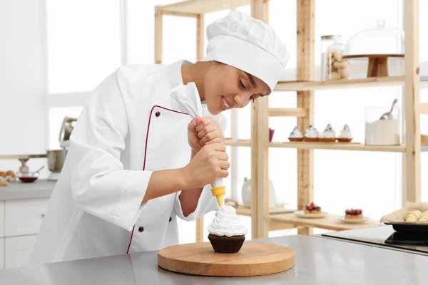 female-pastry-chef-decorating